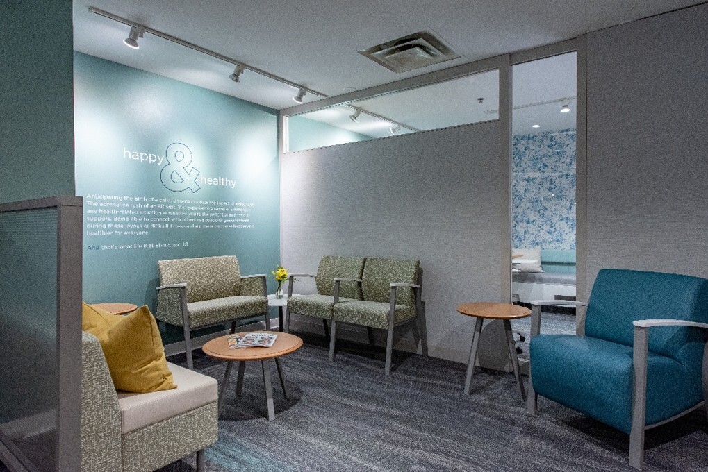 sitting area with demountable wall with glass and textile panels