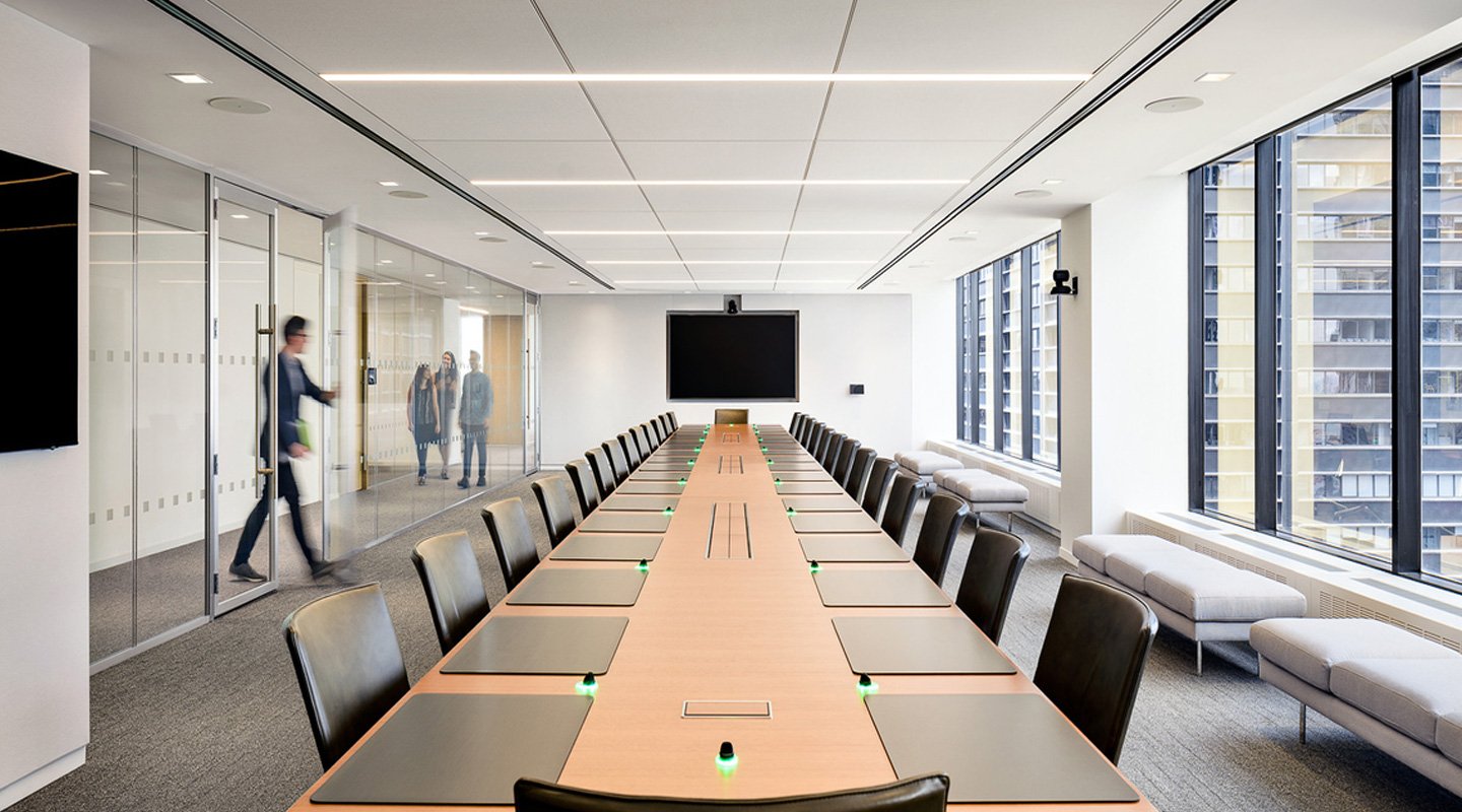 Long-conference-table-in-a-glass-conference-room-for-SIFMA-in-NYC